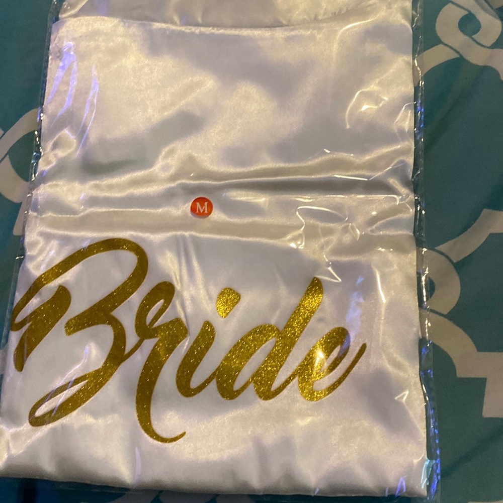 Ride robe with gold writing